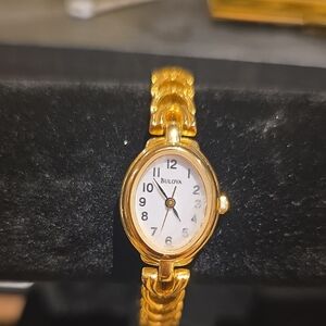 Bulova Gold Oval Bracelet Watch with White Dial